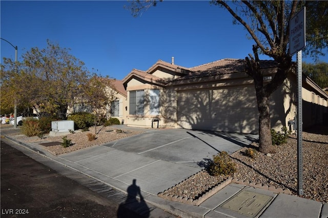 view of front of property with a garage