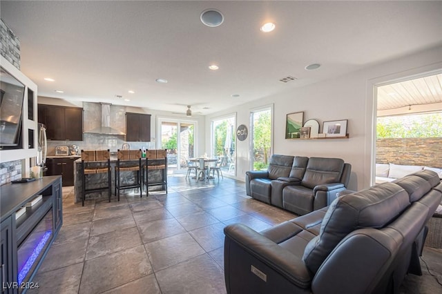 living room with ceiling fan