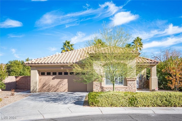 view of front of property with a garage