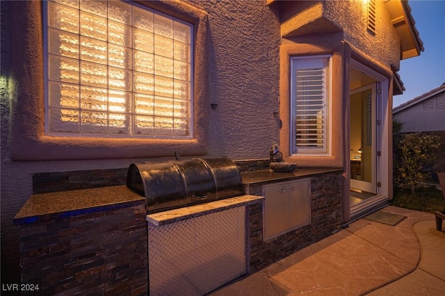 view of patio / terrace with grilling area and exterior kitchen