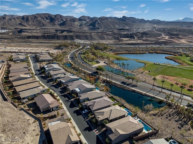 aerial view with a water and mountain view