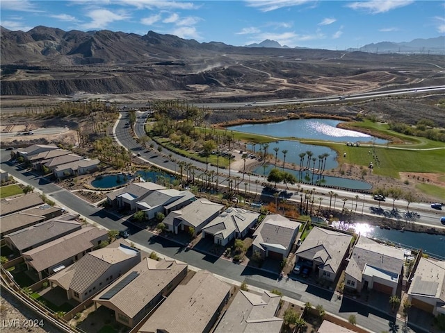 bird's eye view featuring a water and mountain view