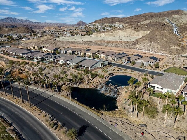 drone / aerial view featuring a mountain view