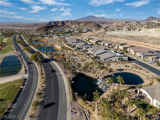 drone / aerial view featuring a mountain view