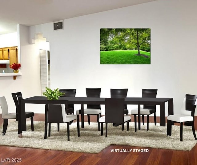 dining room featuring hardwood / wood-style flooring