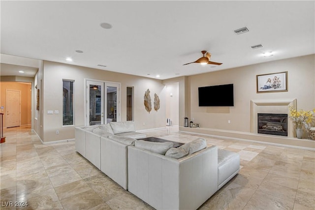 living room featuring ceiling fan