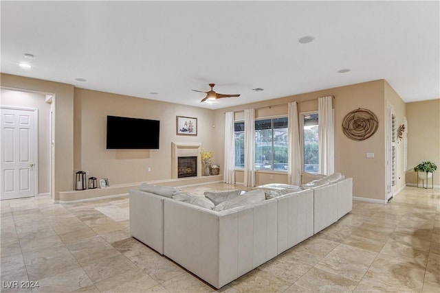 living room with ceiling fan