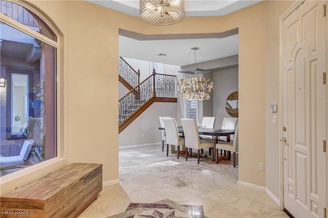 dining area with a notable chandelier