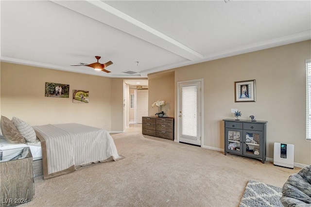 bedroom with light carpet, ceiling fan, and beamed ceiling