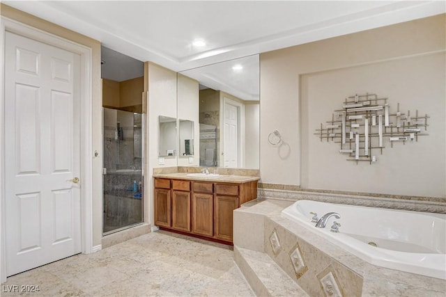 bathroom featuring plus walk in shower and vanity