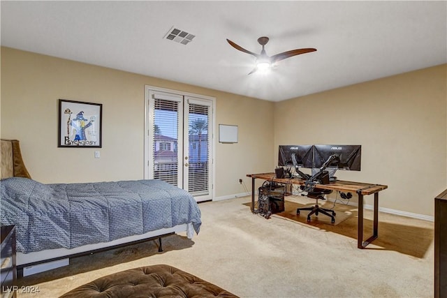 bedroom featuring ceiling fan, light colored carpet, access to outside, and french doors