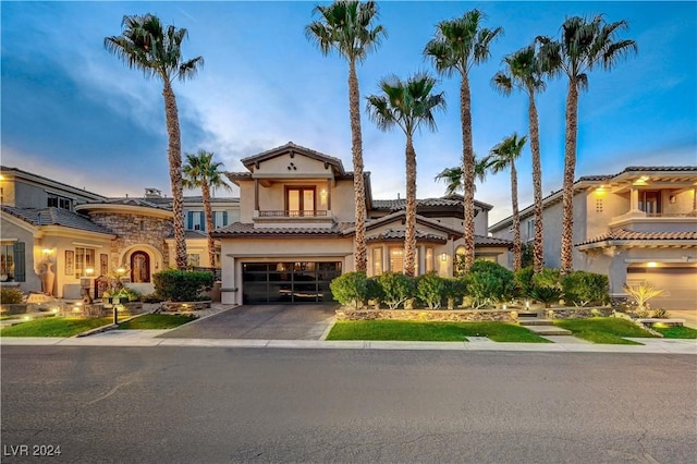 mediterranean / spanish-style house featuring a garage