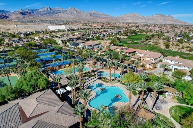 birds eye view of property featuring a mountain view