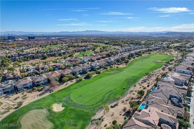 birds eye view of property featuring a mountain view