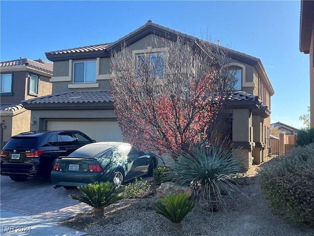 view of front of home featuring a garage