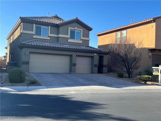 view of front of home with a garage