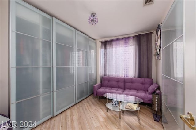 living area featuring hardwood / wood-style flooring