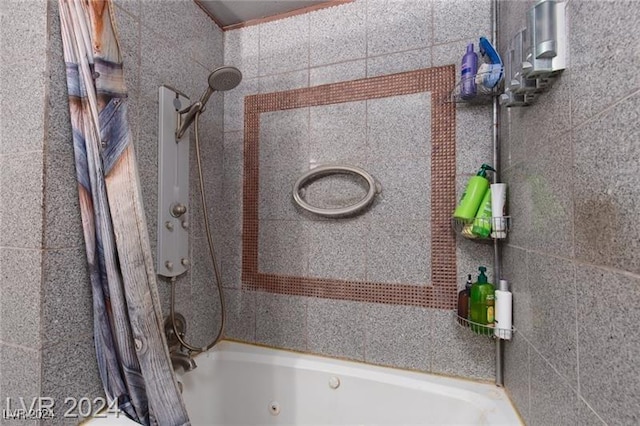 bathroom featuring shower / tub combo with curtain