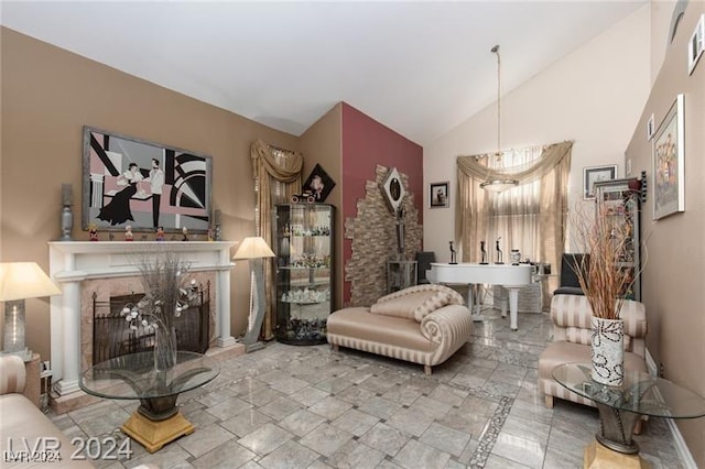 sitting room with vaulted ceiling