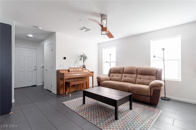 living room with ceiling fan