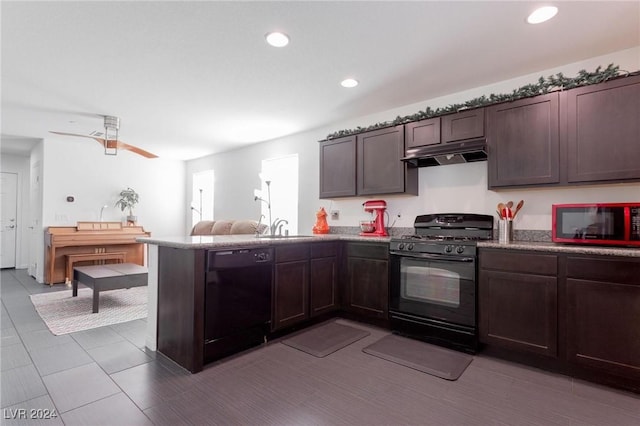 kitchen featuring kitchen peninsula, dark brown cabinets, ceiling fan, sink, and black appliances