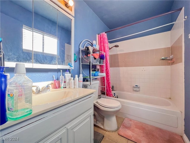 full bathroom featuring tile patterned floors, shower / bath combination with curtain, toilet, and vanity