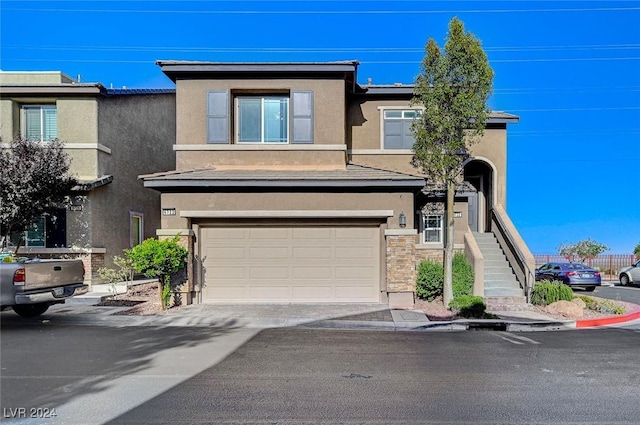 view of front of property with a garage