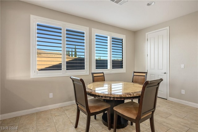 dining room featuring a wealth of natural light