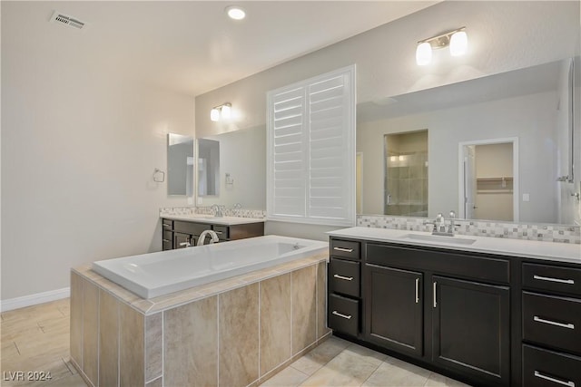 bathroom featuring tile patterned floors and vanity