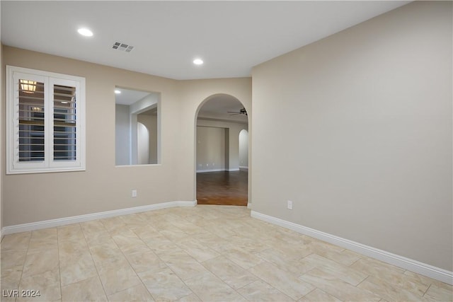 spare room featuring ceiling fan