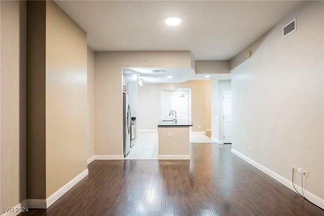 200 W Sahara Ave Unit 1510, Las Vegas, NV 89102 - spare room with dark wood finished floors and recessed lighting