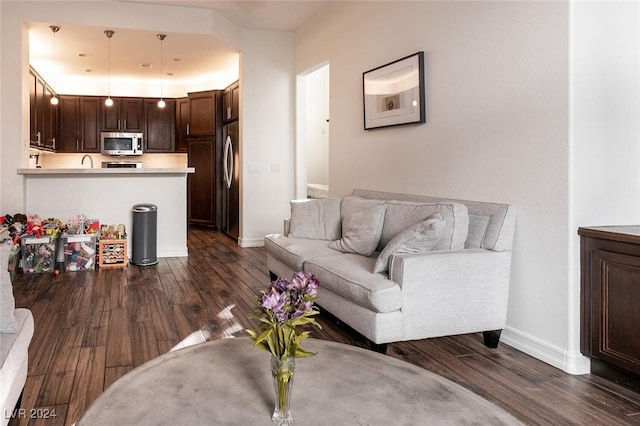 living room featuring dark hardwood / wood-style flooring