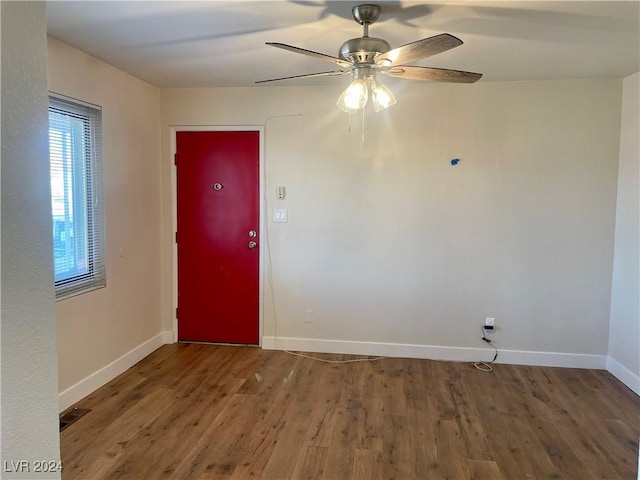 spare room featuring ceiling fan and hardwood / wood-style floors