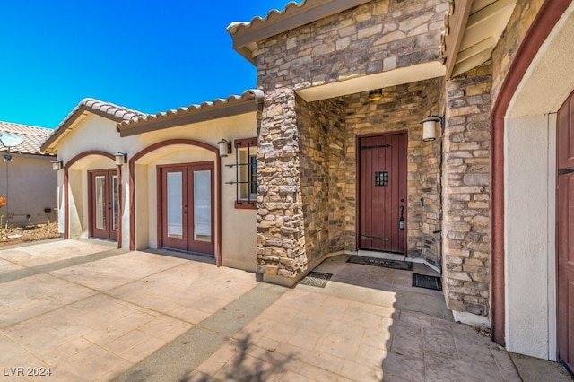 property entrance with french doors