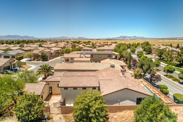 drone / aerial view featuring a mountain view