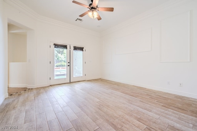 empty room with ceiling fan, crown molding, french doors, and light wood-type flooring