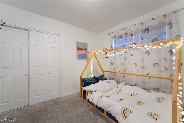 unfurnished bedroom featuring carpet floors and a closet