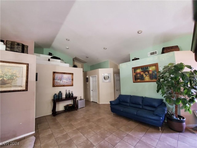 tiled living room featuring lofted ceiling