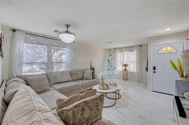 living room with a chandelier