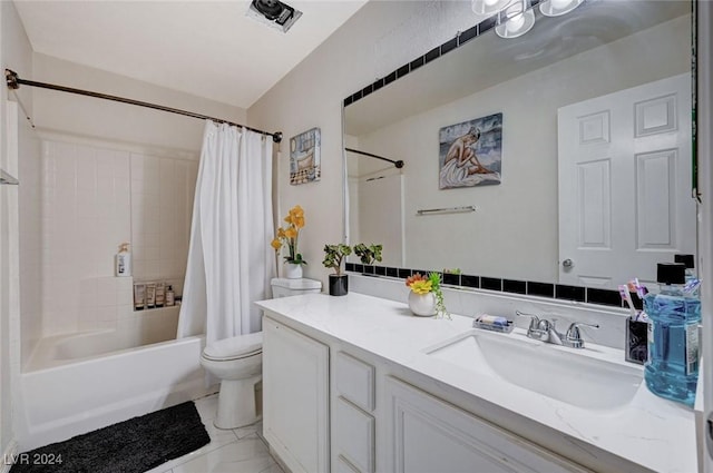 full bathroom featuring toilet, vanity, and shower / tub combo with curtain