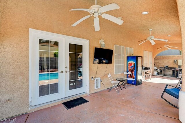 view of patio / terrace with french doors and ceiling fan