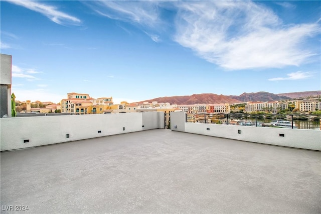 view of patio / terrace featuring a mountain view