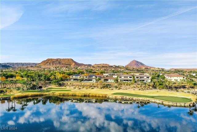 water view featuring a residential view and a mountain view