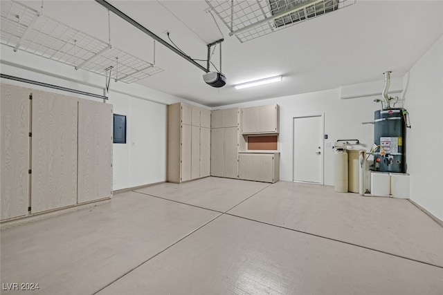 garage with strapped water heater, a garage door opener, and electric panel