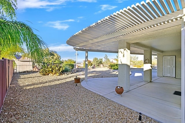 view of patio featuring a pergola