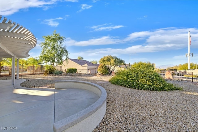 view of yard featuring a patio area and a pergola