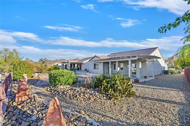 rear view of property with a patio area