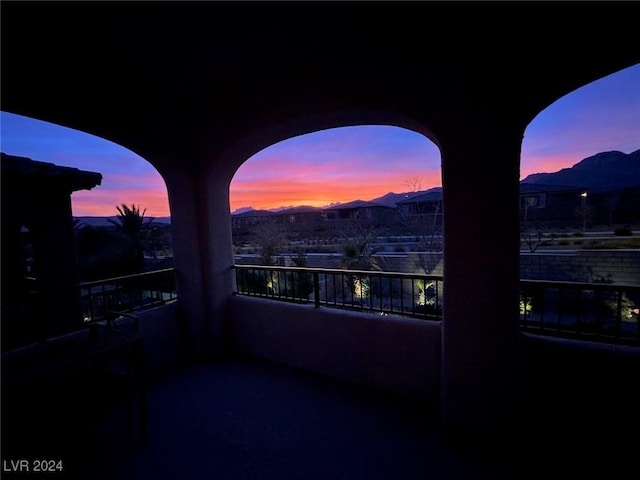 patio terrace at dusk with a balcony