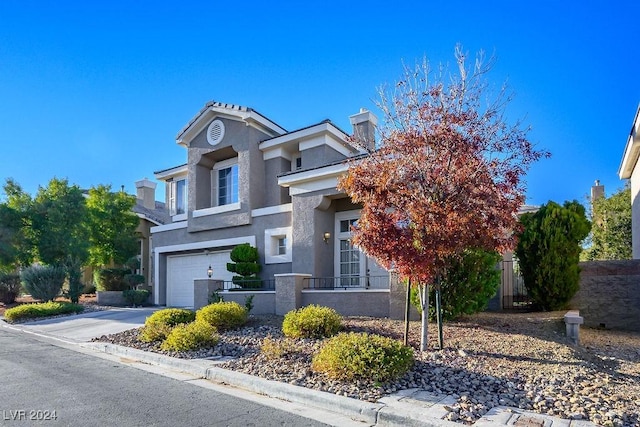 view of front of property with a garage