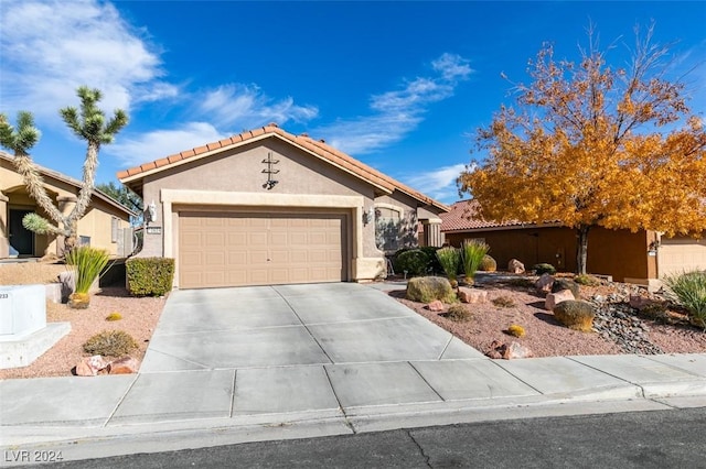 view of front of property with a garage